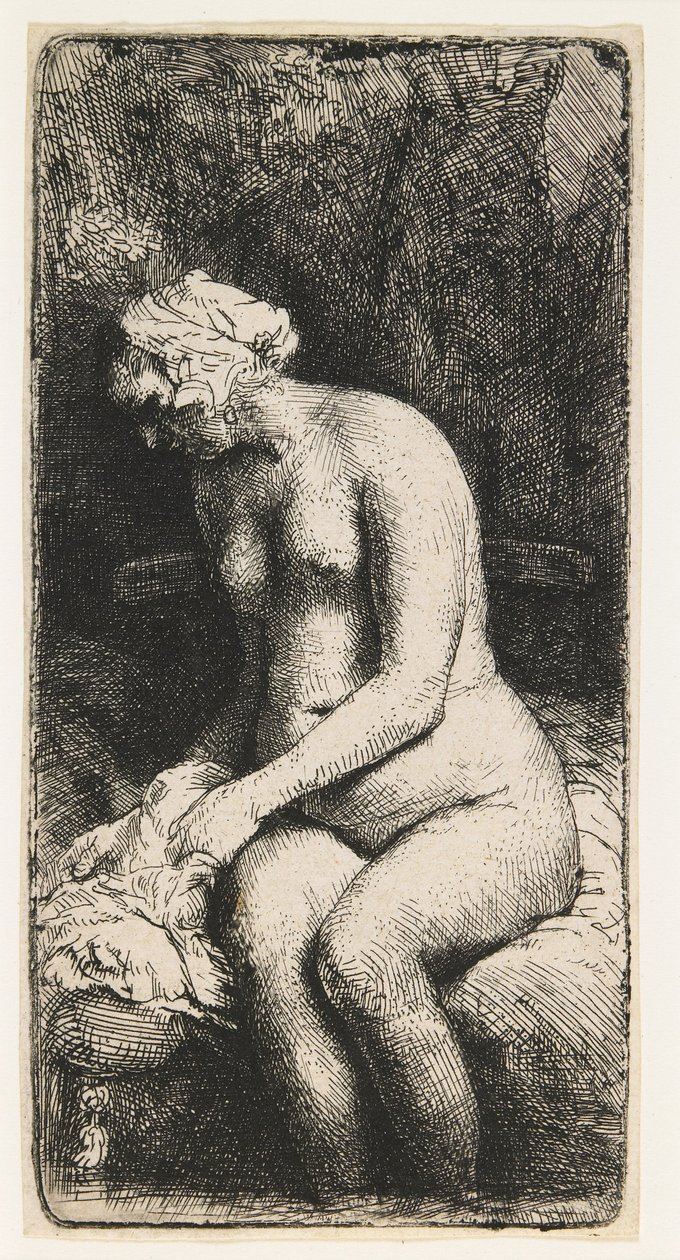 Žena si koupe nohy u potoka od Rembrandt van Rijn