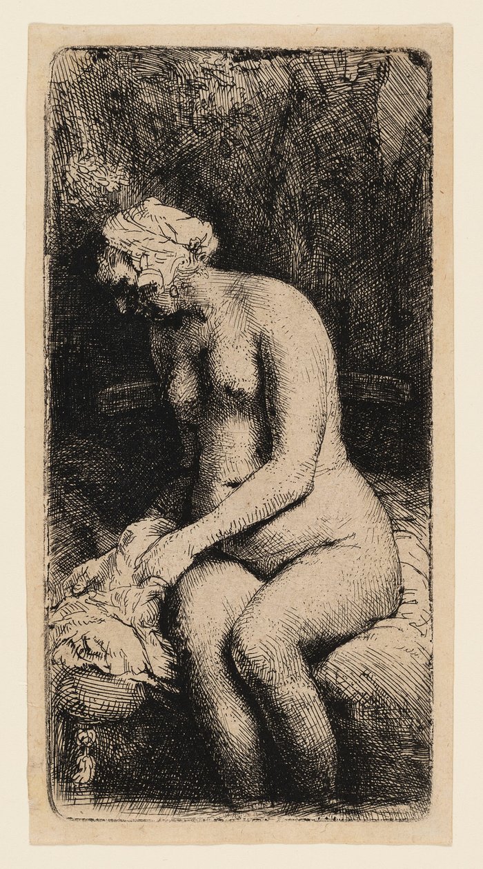Žena si koupe nohy u potoka od Rembrandt van Rijn