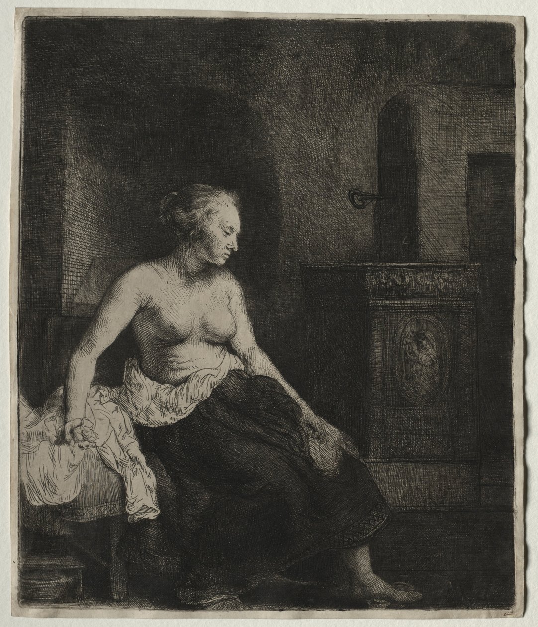 Žena sedící napůl oblečená vedle sporáku, 1658. od Rembrandt van Rijn