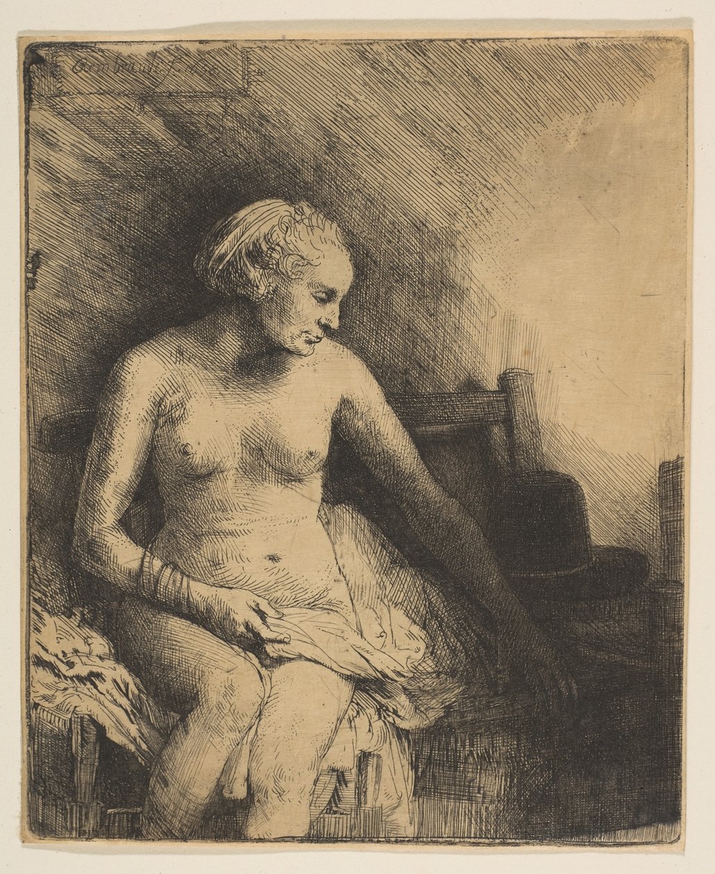 Žena ve vaně s kloboukem vedle ní, 1658. od Rembrandt van Rijn