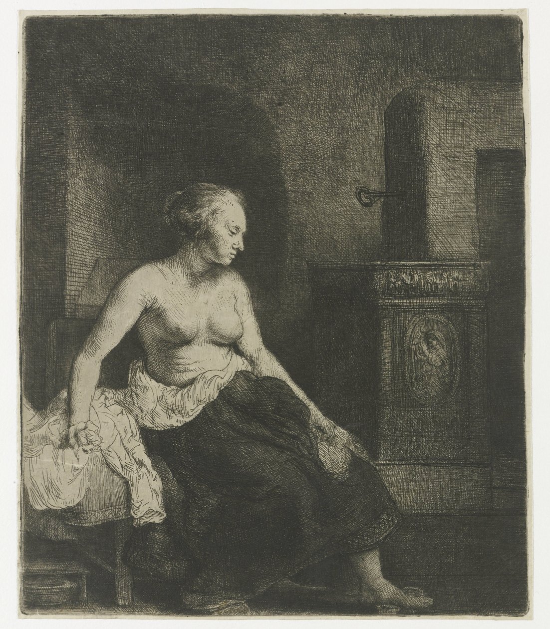Žena sedí napůl oblečená vedle sporáku od Rembrandt van Rijn