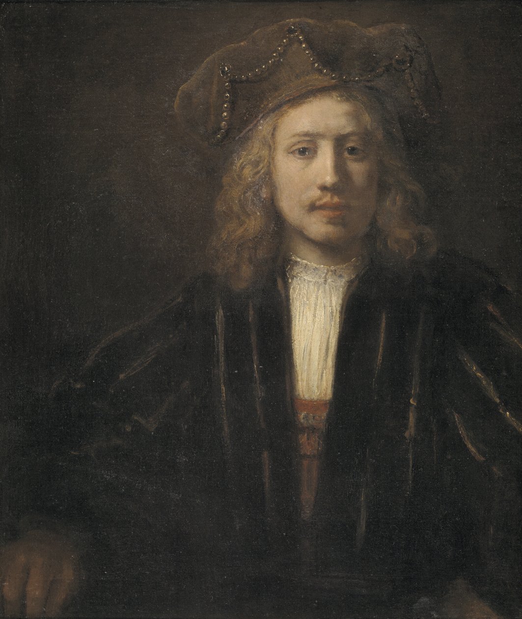 Mladý muž v perleťově zdobené čepici od Rembrandt van Rijn