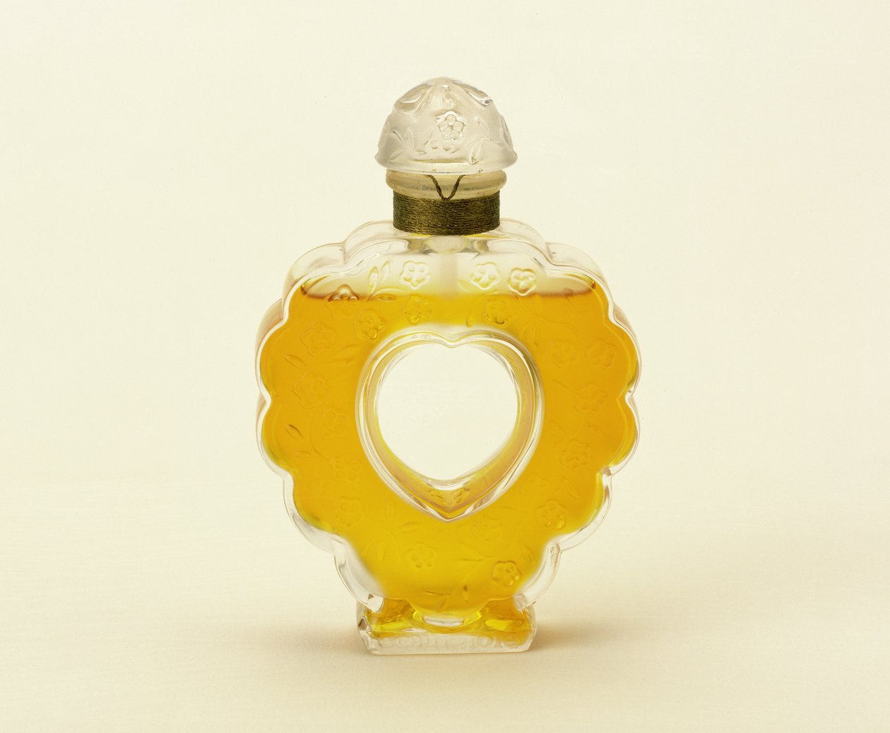 Coeur Joie, čirý matný flakon od Lalique pro Ninu Ricci od Rene Jules Lalique