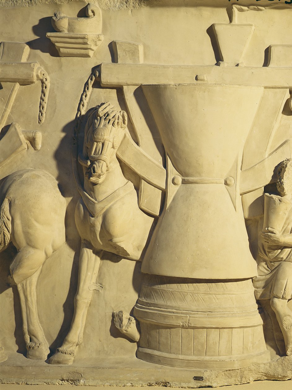 Reliéf zobrazující scénu frézování od Roman