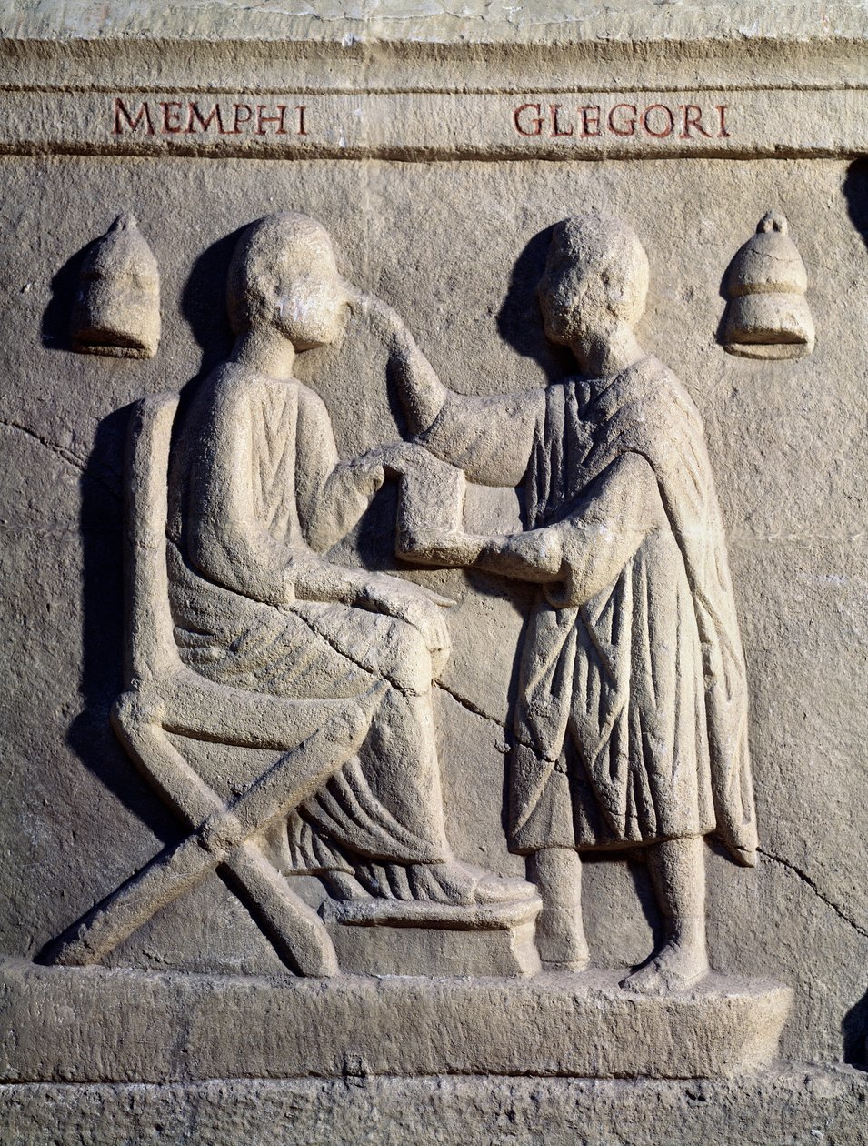 Oftalmolog vyšetřuje oči svého pacienta (dolní reliéf, 2. století) od Roman