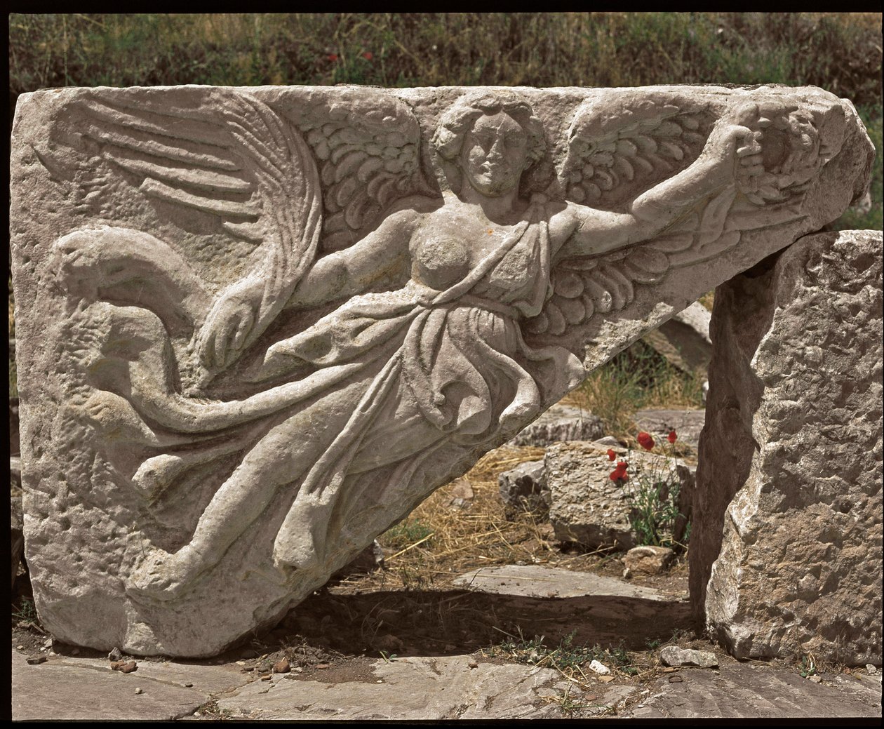Nike. Nízké reliéfní křídlo z 2. stol od Roman