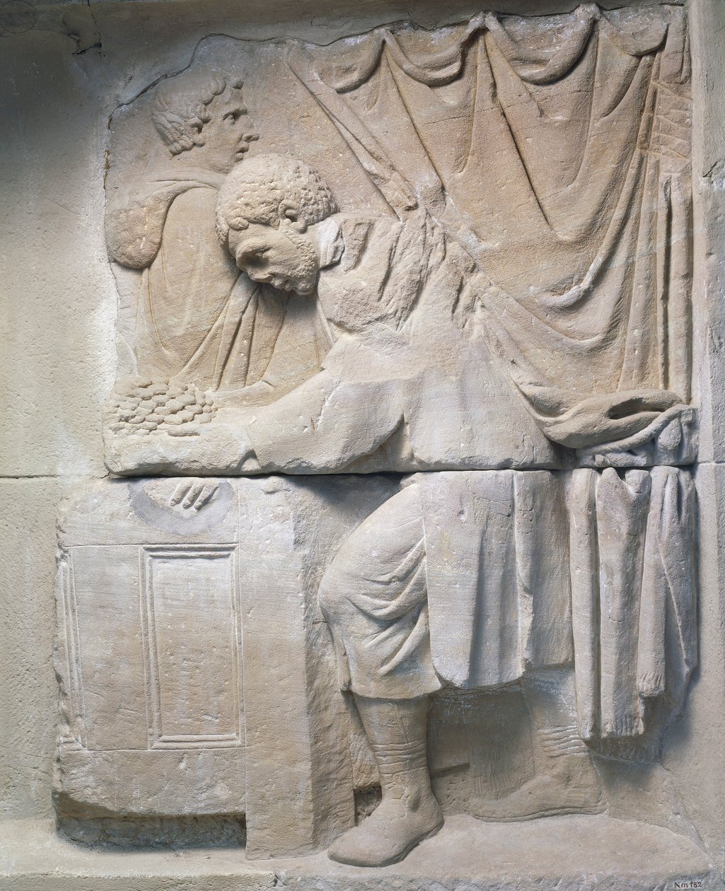 Římský reliéf z mauzolea zobrazující obchodníka s chlebem, 2. století našeho letopočtu od Roman