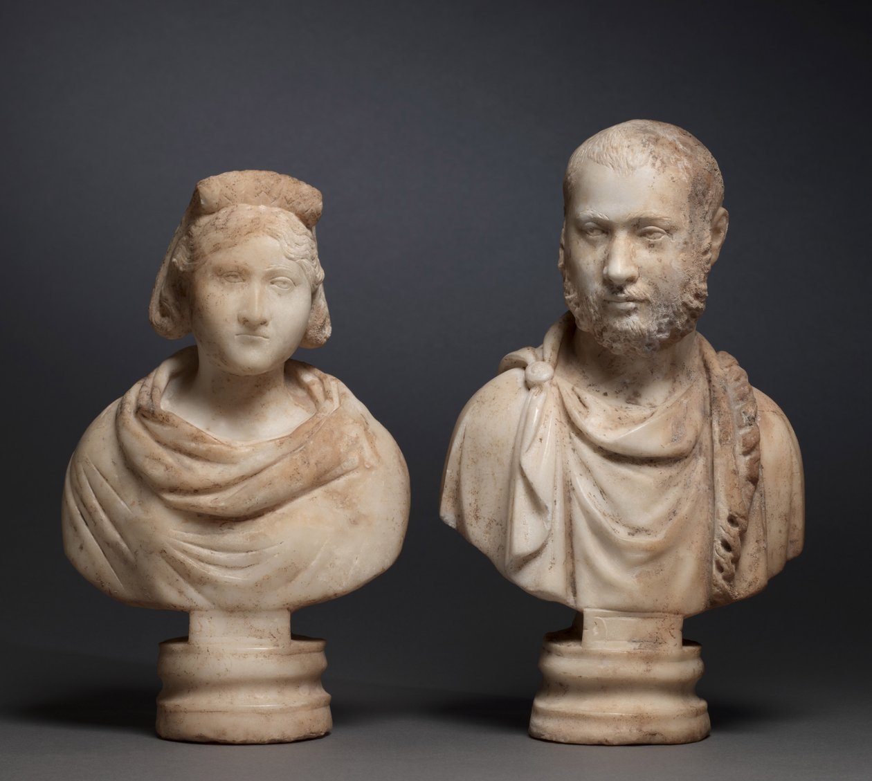 Portrétní busta aristokratky a portrétní busta aristokrata, 280-290 (mramor) od Roman Imperial Period