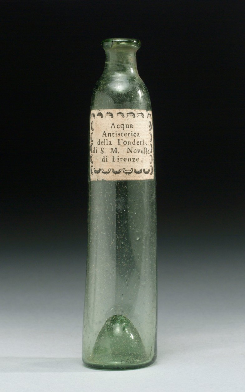 Láhev, která obsahovala vodu proti hysterii, ze slévárny Jeho královské Výsosti, Officina Profumo, Farmaceutica di Santa Maria Novella, Florencie, kolem 1850-1920 (sklo) od School Italian