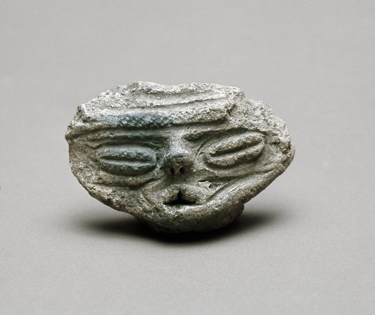 Terakotová hlava, období Jomon 6.-3. století před naším letopočtem od Japanese School