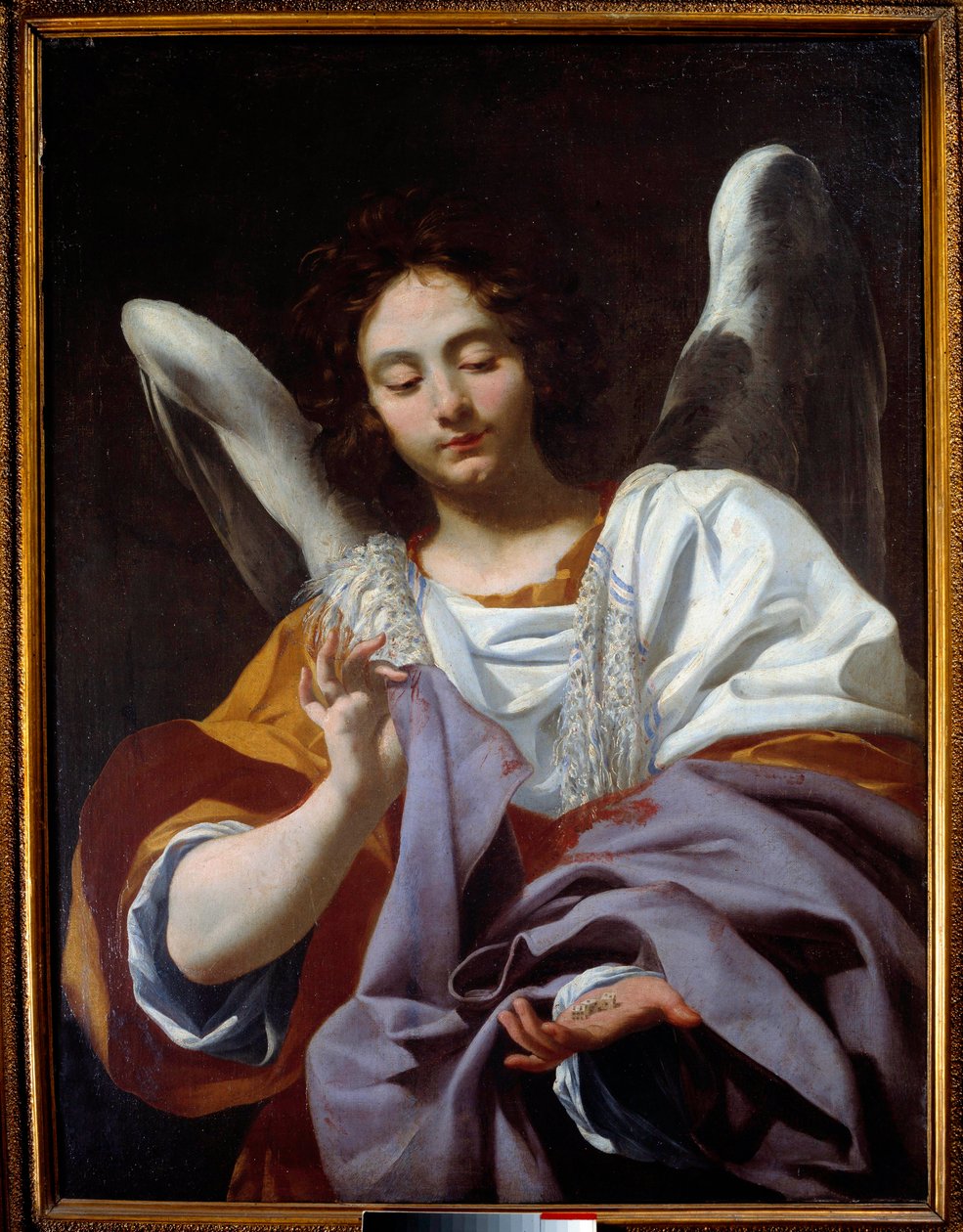 Anděl s tunikou, nástroje pašijového obrazu Simona Voueta (1590-1649) 17. století. Neapol, Národní muzeum Capodimonte od Simon Vouet
