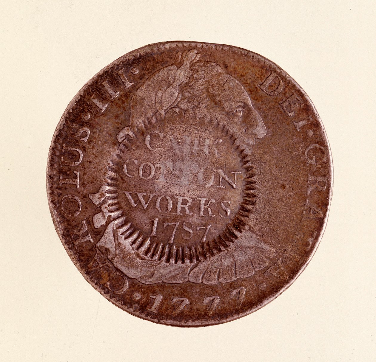 Stříbrná mince (8 realů) ze Španělska: vláda Karla III. (1759-1788). 1777 s kontramarkou 1787. Prům. 3,9 cm Neapol, museo archeologico od Spanish School
