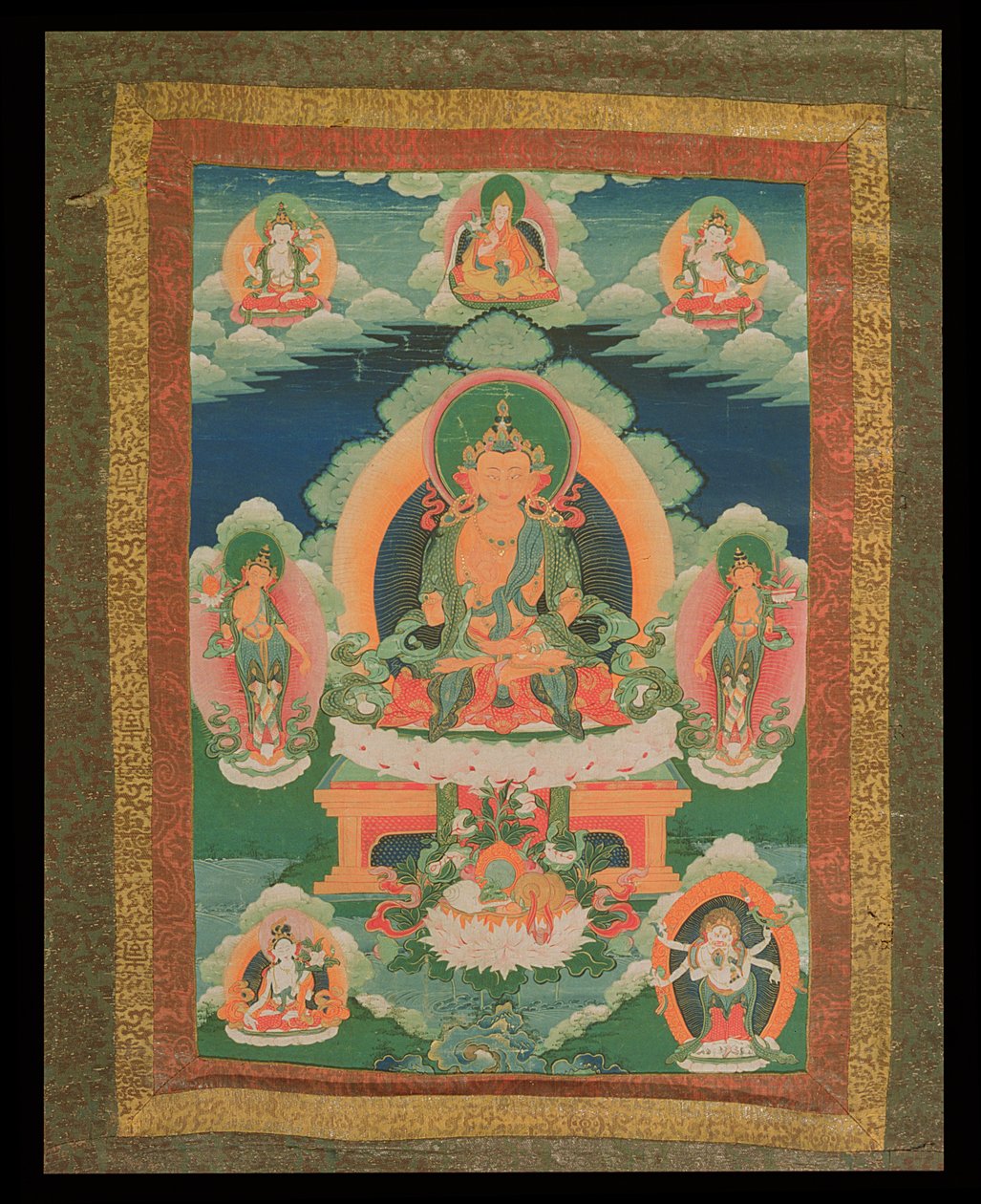 Obraz Thangka zobrazující neidentifikovaného bódhisattvu s různými bódhisattvy, božstvy a svatými muži kolem, z Lhasy, 1780-1880 (papír připevněný na hedvábí) od Tibetan School