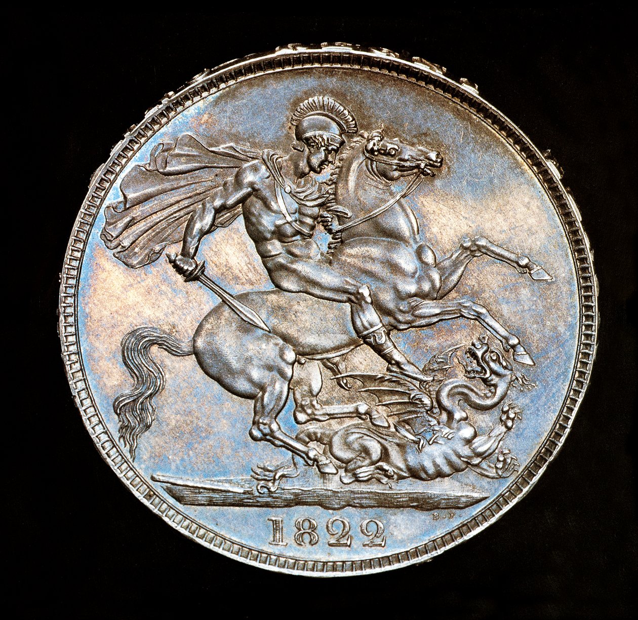 Vzácná britská mince, král Jiří IV., stříbrná koruna, patron Anglie na koni s mečem, který se chystá zabít draka, ražba Bernedetto Pistrucci od Unbekannter Künstler