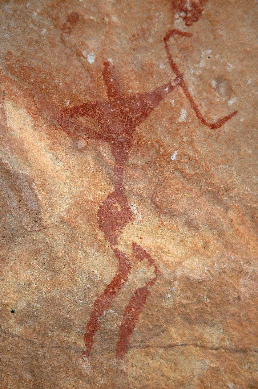 Skalní umění, Prehistorie: Malba postavy (lučištníka) ve zdobeném úkrytu v masivu Uweinat v Súdánu (Karkur-Talh nebo Karkur Talh). Období od 8000 do 3000 let před naším letopočtem. Fotografování od Unbekannt