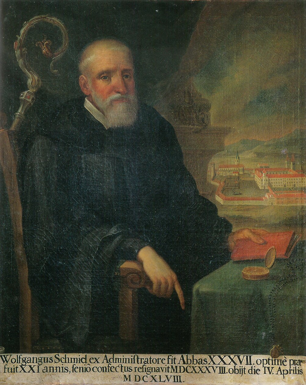 37. opat Wolfgang Schmid, v pozadí pohled na klášter sv. Jiří (Isny) od Unknown