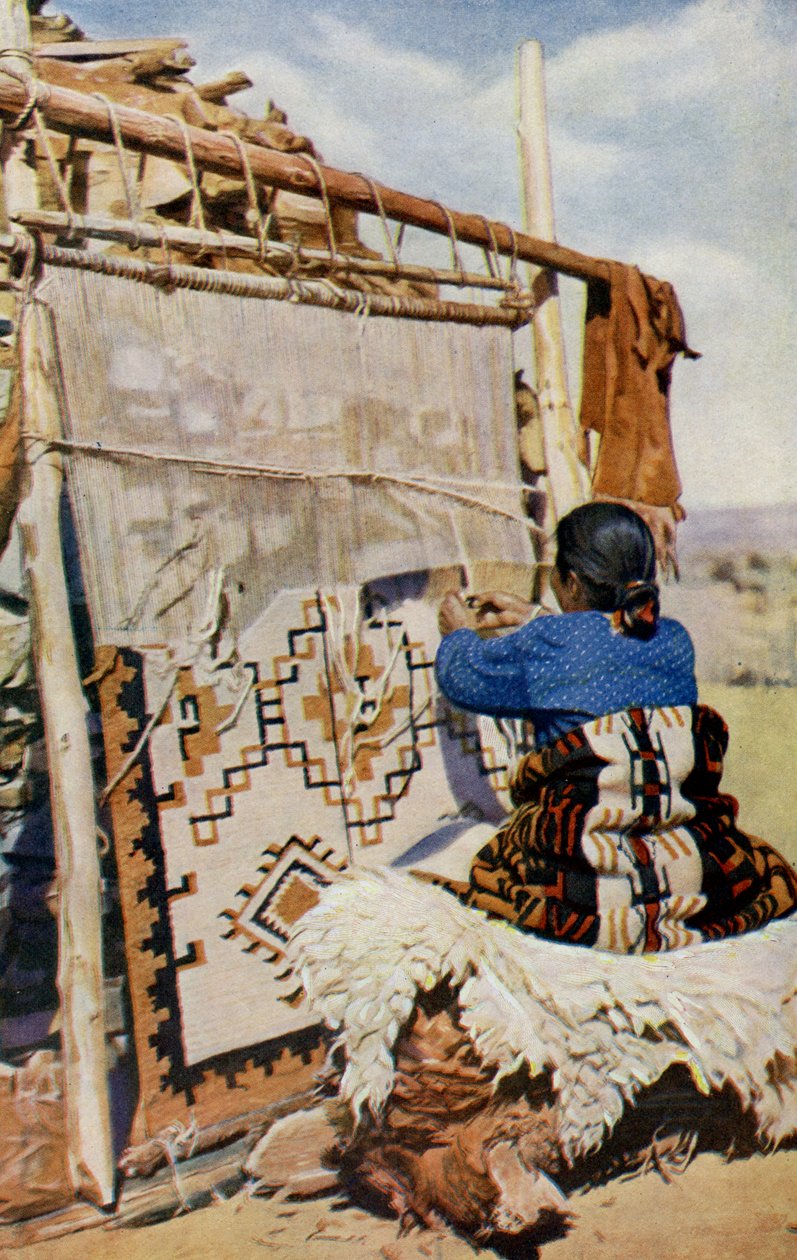 Arizona. V srdci pouště Arizony se tkají přikrývky Navajo, jejichž krása a užitečnost přitahuje mnoho zákazníků. 1920 od Unknown