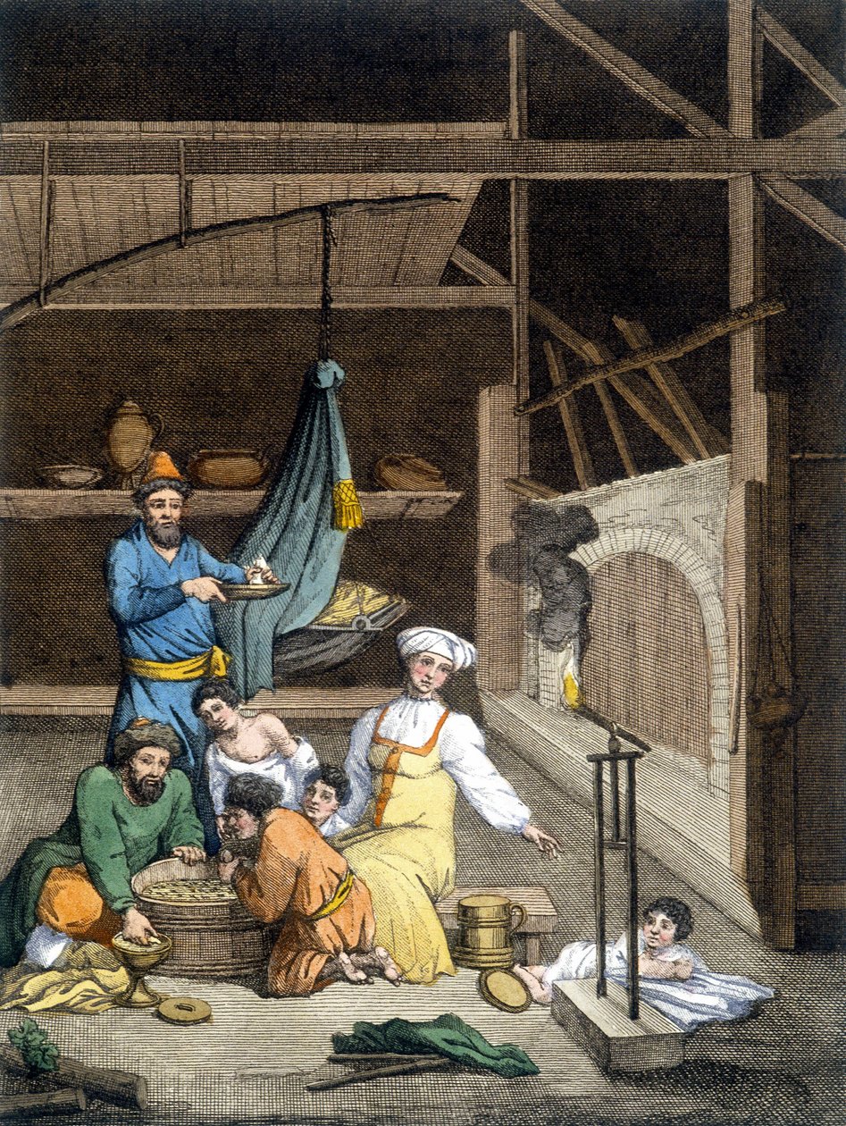 Uvnitř ruského domu rodina v době oběda. od Unknown artist