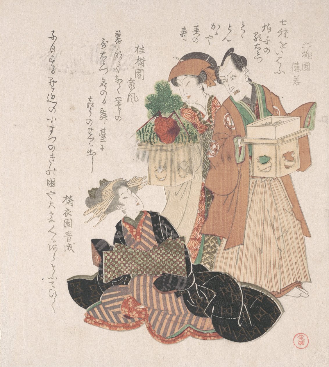 Herec Nakamura Utaemon se dvěma ženami připravujícími se na novoroční obřad, 19. století. od Utagawa Toyokuni I