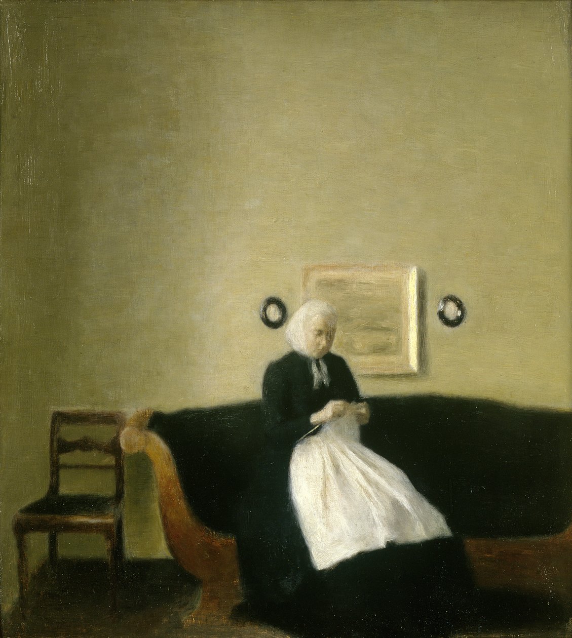 Interiér s umělcovou matkou od Vilhelm Hammershoi