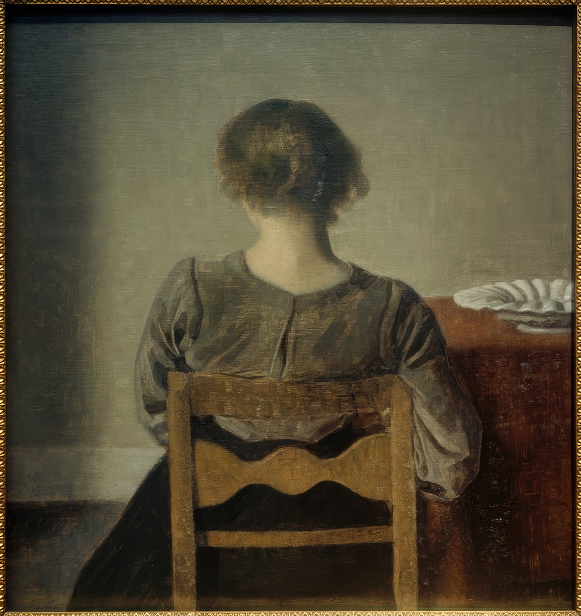 Mladá žena. Odpočinek od Vilhelm Hammershoi