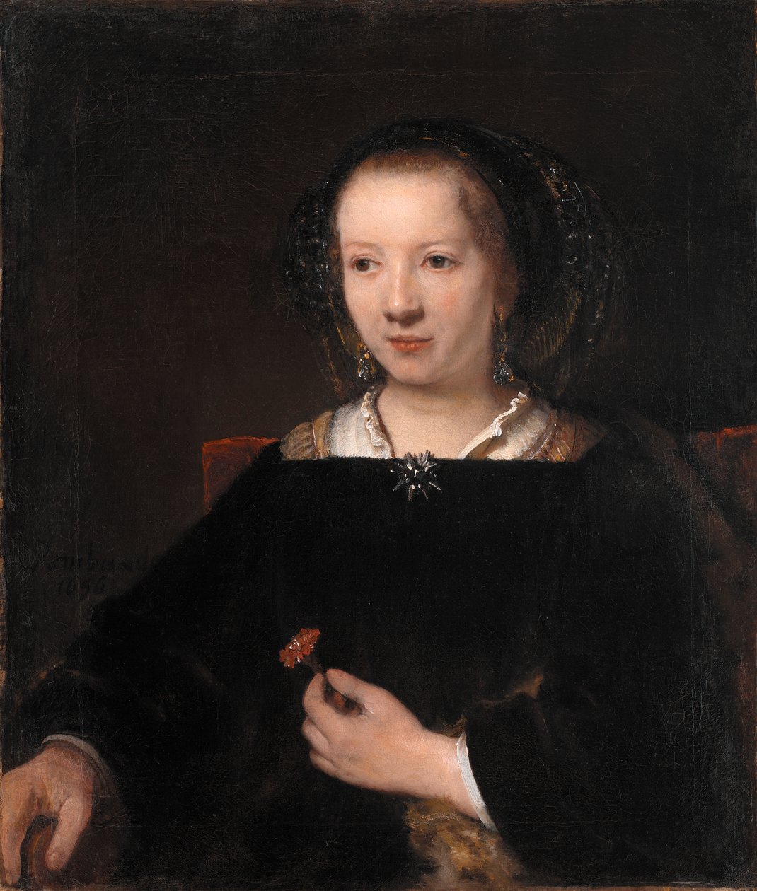 Mladá žena s karafiátem od Willem Drost