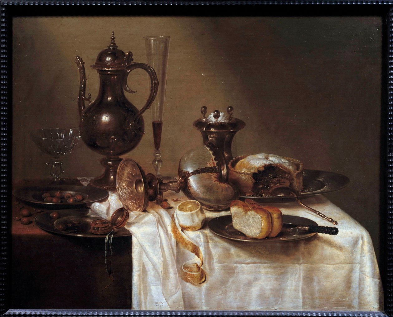 Zátiší u nautilského stolu pokrytého stříbrem, chlebem, vinnou flétnou, koláčem a oloupaným citronem. Obraz Willema Hedy (1594-1670) 1642 Saint Etienne, Museum of Fine Arts od Willem Claesz. Heda