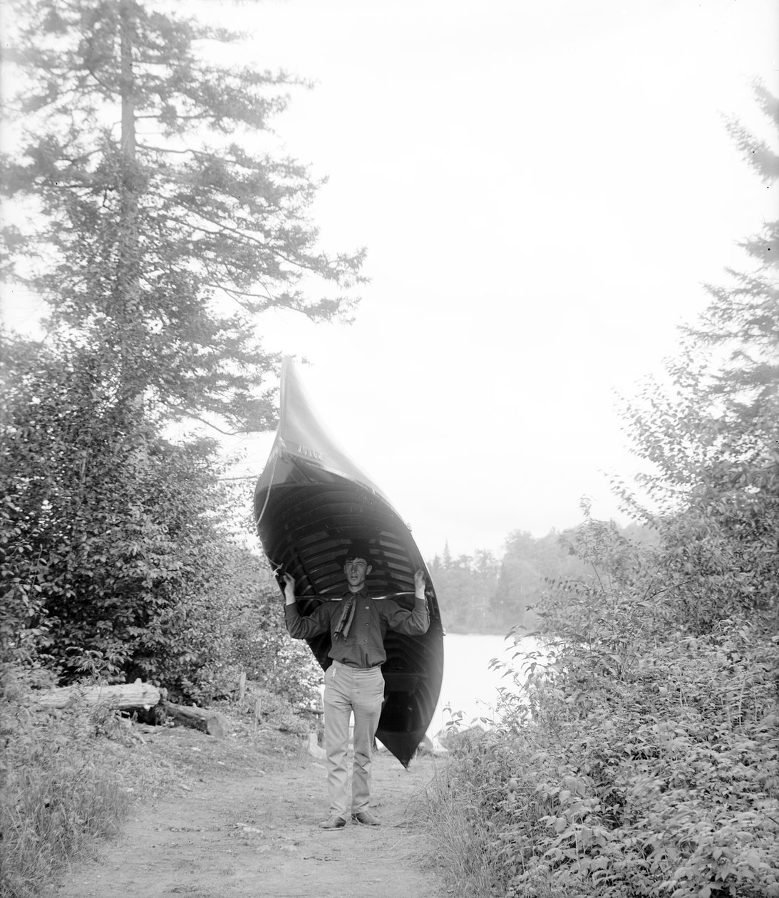 Převážení kánoe v pohoří Adirondack od William Henry Jackson