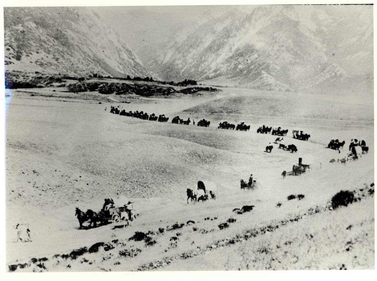 Průkopníci sbírající imigranty z vlakového nádraží a vedou je do Mormon Salt Lake City od William Henry Jackson
