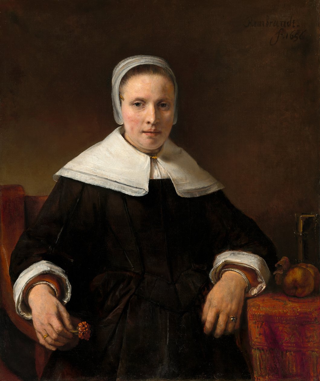 Žena držící růžovou od Workshop of Rembrandt