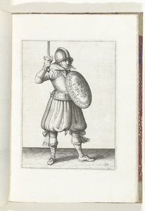 Cvičení The Shield and Spike: The Soldier prezentuje svůj rapír rukou ne výš než jeho tvář (č. 19), 1618 Nassausche Wapen-Handelinge, van Schilt, Spies, Rappier a Targe: beyde figuerlick vyobrazen a zarámovaný podle nového řádu