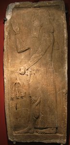 Kněz s větví stromu granátového jablka. Detail reliéfu z paláce asyrského krále Sargona II., 722-705 př.n.l. od Assyrian