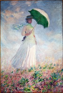 Žena se slunečníkem otočená doprava od Claude Monet