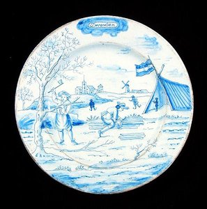 Delftware talíř zobrazující měsíc prosinec (cínem glazovaná kamenina) od Dutch School