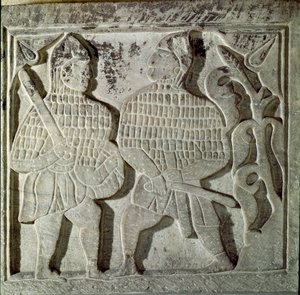 Seljukide Art (Seljukide nebo Saljuqide): nízký reliéf představující dva válečníky. Z Konya, Turecko. 13. století. Muzeum tureckého islámského umění, Istanbul