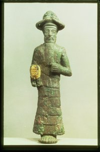 Elamitský bůh se zlatou rukou ze Susa, jihozápadní Írán, cca 1800-1700 př. n. l. (bronz a zlato)