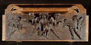 Poškozený misericord zobrazující tři muže bojující s dýkami a meči, New College Chapel, Oxford, konec 14. století (dřevo)