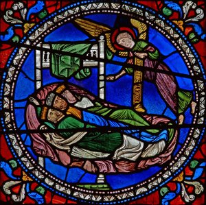 Detail z jednoho z biblických oken zobrazující tři krále mudrců spící s andělem od English School