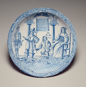 Miska se sedící královnou Kateřinou s botou osazenou klečícím kavalírem, 1677 (cínová glazovaná kamenina) od English School