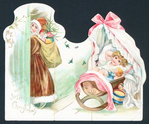 Santa navštěvující dítě v postýlce, vánoční přání od English School