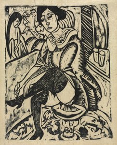 Žena si nazouvá boty od Ernst Ludwig Kirchner