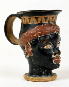 Etruská váza ve tvaru hlavy černocha. Museo Nazionale de Tarquinia.