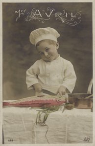Malý chlapec vaří rybu (barevná fotografie) od French Photographer
