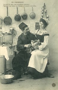 Sluha sedí na mans koleno v kuchyni od French Photographer