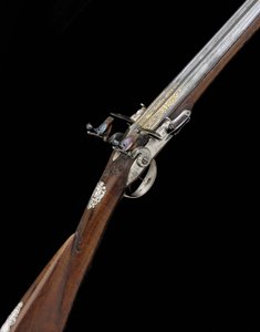 Jemný a vzácný francouzský D.B. se stříbrnou montáží 20 Sportovní pistole Flintlock, kolem roku 1725 od French School