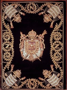 Obálka jednoho z dvanácti původních vydání „Code civil des francais““ vyhlášeného Napoleonem Bonapartem dne 21.3.1804. Je vázaná v sametové výšivce ze zlata a stříbra se znakem spravedlnosti a pažemi císaře. Francouzský zákon o občanských právech. B.N od French School