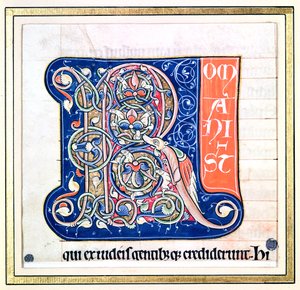 Historická iniciála „R“ zobrazující propletený vzor s fantastickými zvířaty, z Bible Saint-Andre aux-Bois od French School