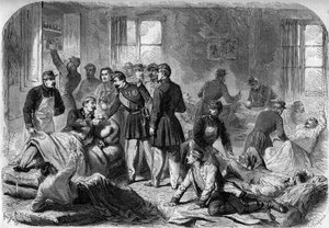 Návštěva císaře Napoleona III. na ranách z bitvy u Montebella v improvizovaných sanitkách ve Vogheře dne 21. května 1859. Rytina podle náčrtu od Moullina. od French School