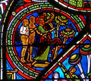 Okno w15 zobrazující okno Milosrdného Samaritána: Bůh ukazuje Adamovi a Evě na zakázané ovoce od French School
