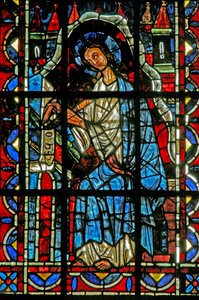 Okno w202 zobrazující svatého Jana píšícího evangelium od French School